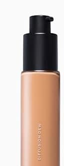 MAKE Beauty Diffusion Dew Skin Tint. Sheer to Medium Coverage Radiant Finish. Blurring, Smoothing, and Brightening for Glowing Complexion. Enhanced with Niacinamide and Adenosine. Caramel 08