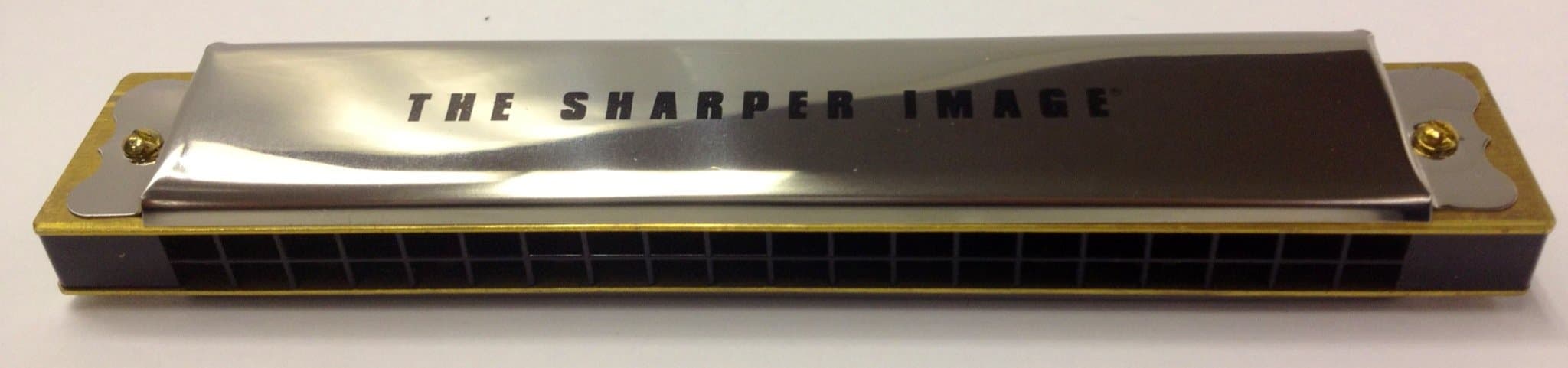 The Sharper Image 20 Note Harmonica - Chrome top with brass colored body