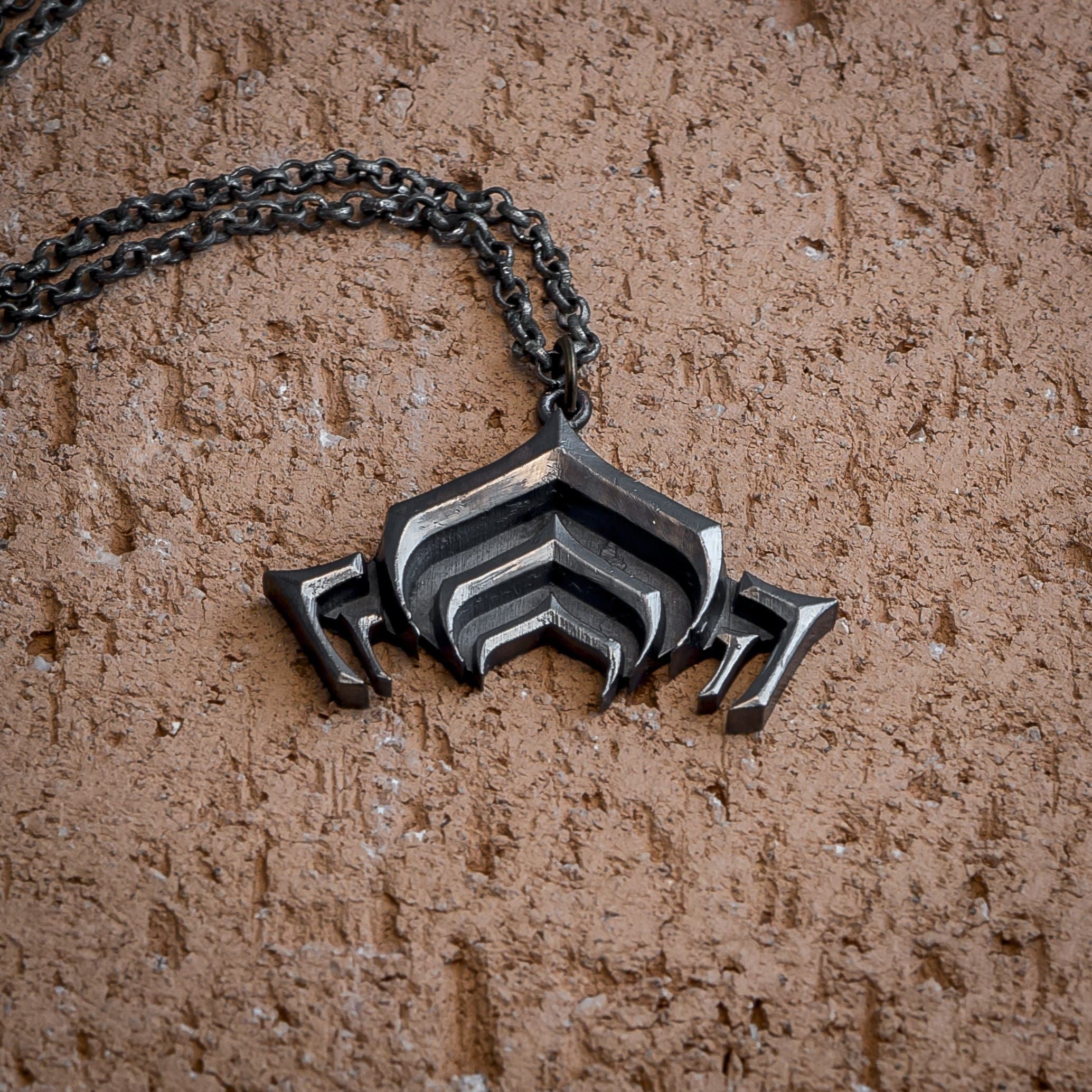Warframe Lotus silver pendant
